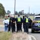 Police on the Western Highway near the Ballarat Saleyards as officers tracked a vehicle with two people inside on April 30, 2024. Picture by Lachlan Bence.